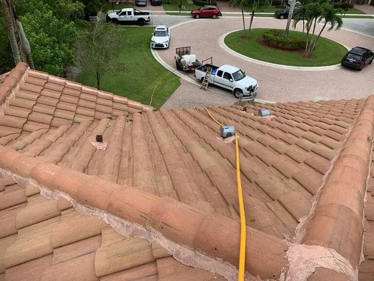 Roof cleaning in process